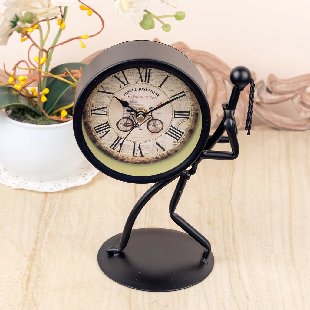 Black Metal Bolt Man Holding Up Clock