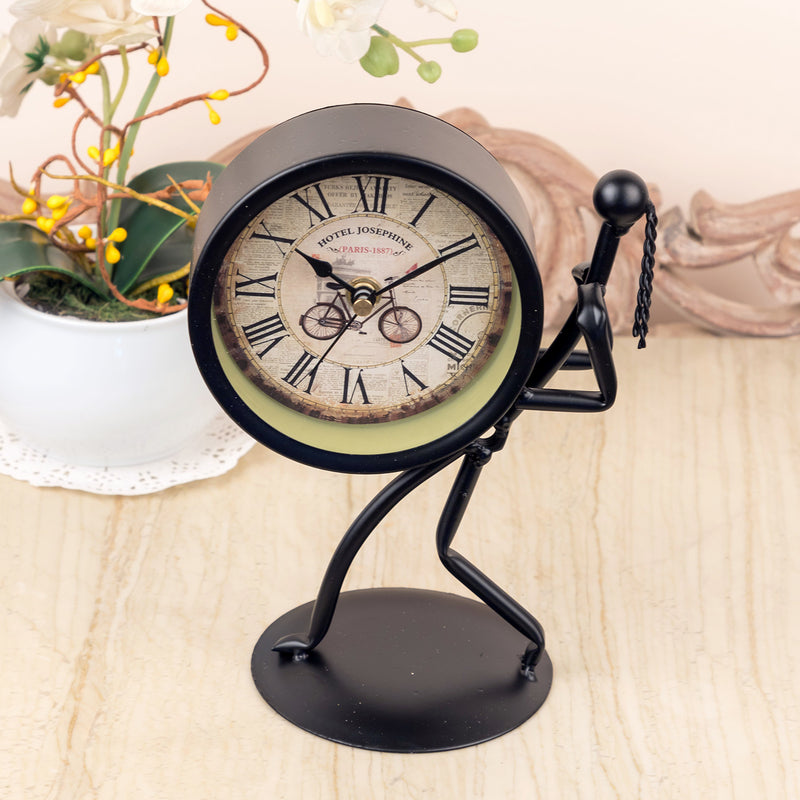 Black Metal Bolt Man Holding Up Clock